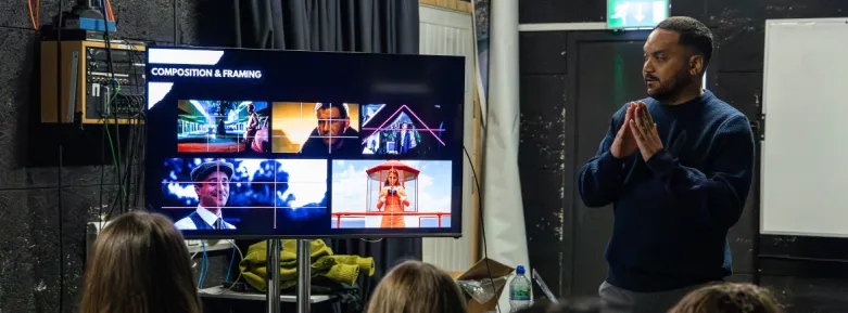 Blog - Header, Arthur Lopez talking to students