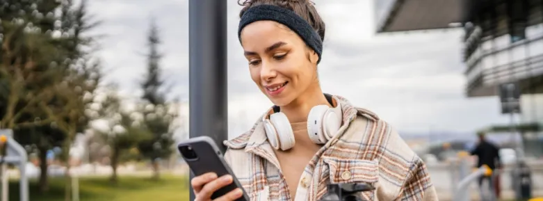Woman on Phone - The five best apps for university students to improve productivity