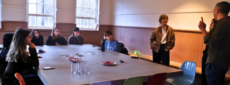 Graphic Design students listening to a presentation