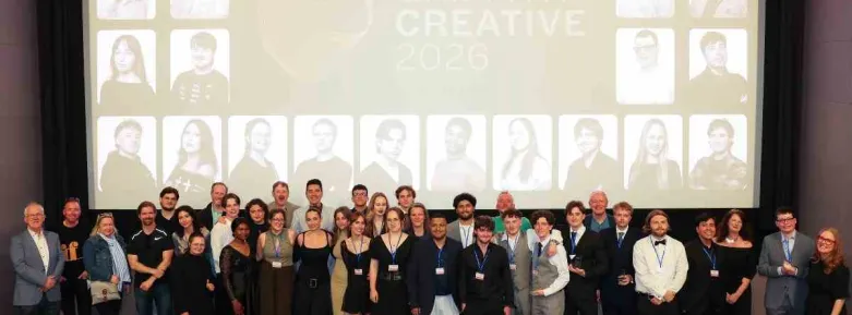 a group of people posing for a photo