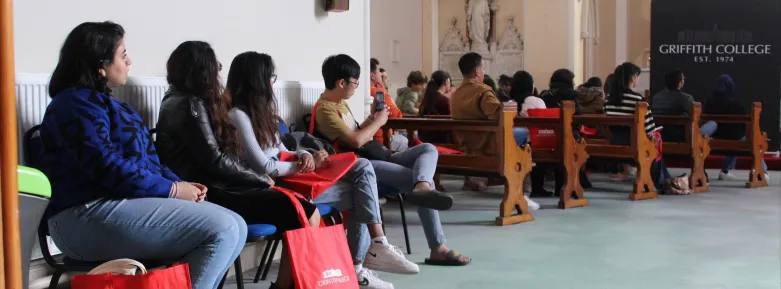 Students sitting in Honan Chapel at Griffith College Cork induction