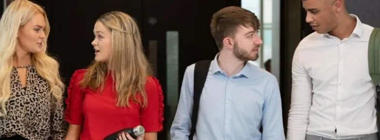 Students walking in a corridor