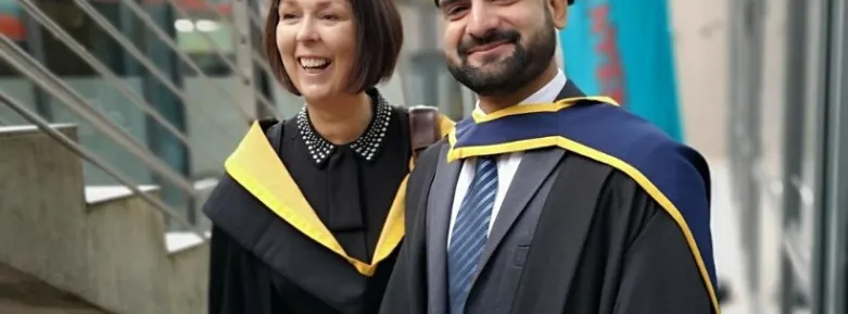 Accountancy lecturer Paula Byrne with a graduating student