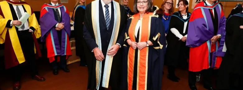 Chair of the Policing Authority Josephine Feehily accepting the Distinguished Fellowship Award from the President of Griffith College Professor Diarmuid Hegarty 