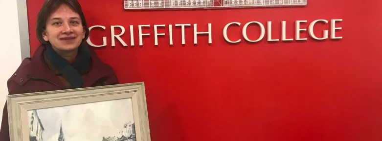 Tetiana Milshyna and her painting at Griffith College Cork