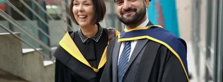 Accountancy lecturer Paula Byrne with a graduating student