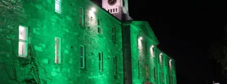 Griffith College's main building lit up green for Culture Night 2019
