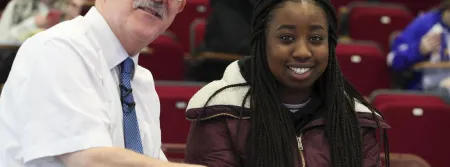 Dr Tomás Mac Eochagáin reviews with a leaving cert student