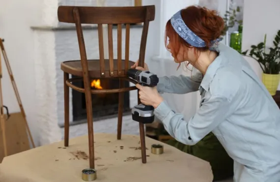 woman fixing chair