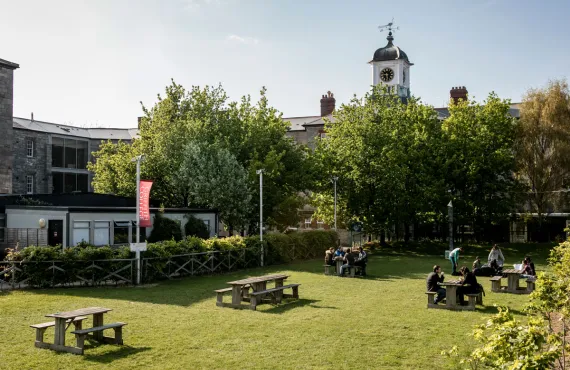 The clock tower overlooking the green at the Griffith College Dublin Main Campus