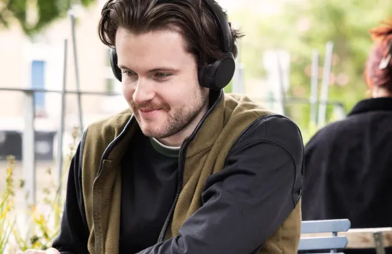 Postgraduate Student studying at laptop