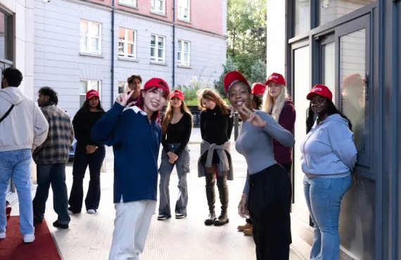Griffith College students waving at the camera