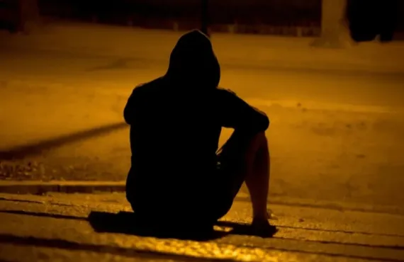 HECA Loneliness man sitting alone