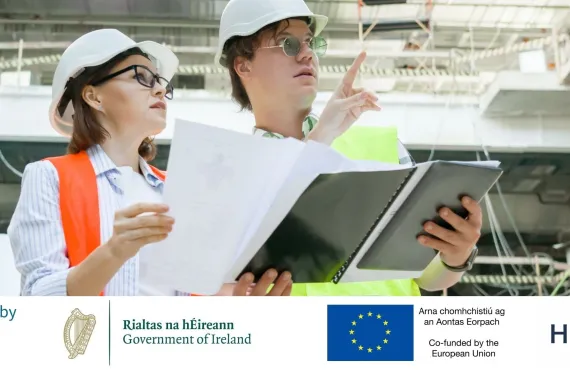 person,woman,man,sitting,holding,people,wearing,table,standing