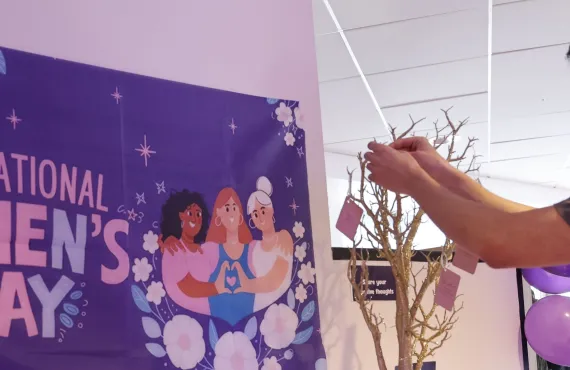 a man holding a sign