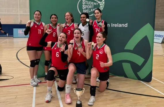 a group of people posing for the camera