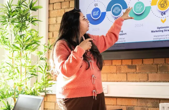 a man standing in front of a window