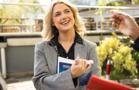 a woman smiling for the camera