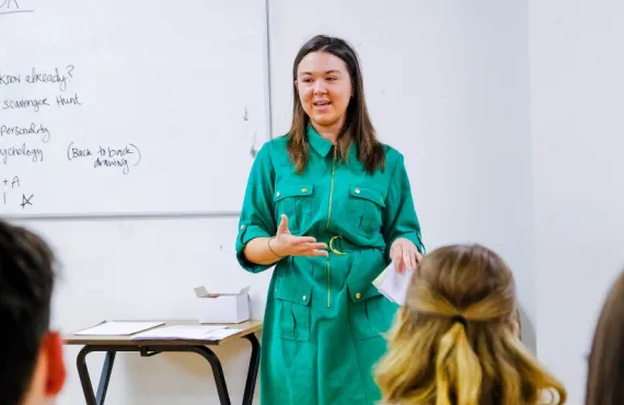 a woman standing in a room