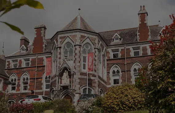 a group of people in front of a church