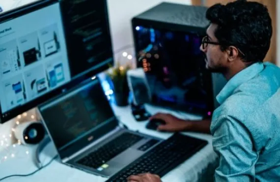 a man using a laptop computer