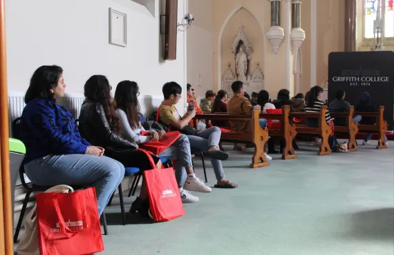Students sitting in Honan Chapel at Griffith College Cork induction