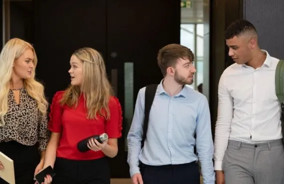Students walking in a corridor