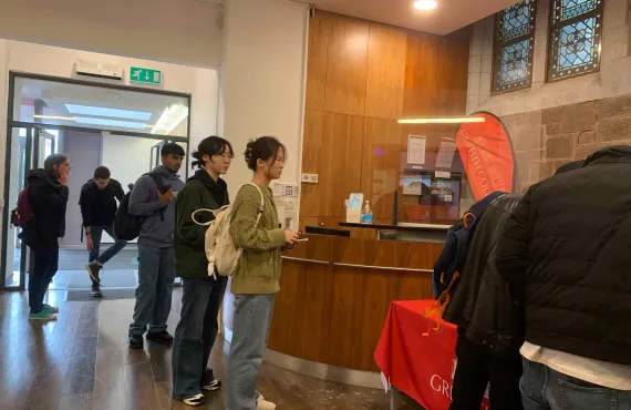 Students waiting in line for induction at Griffith College Cork 