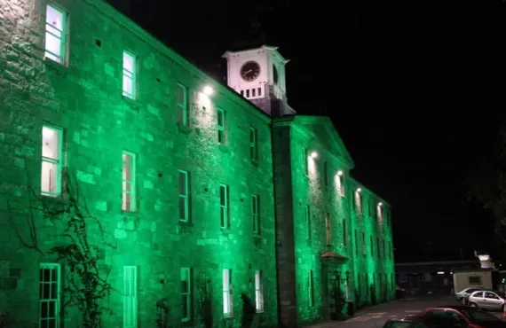 Griffith College's main building lit up green for Culture Night 2019