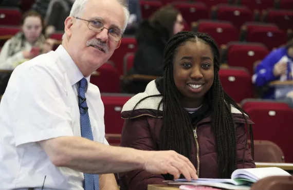 Dr Tomás Mac Eochagáin reviews with a leaving cert student