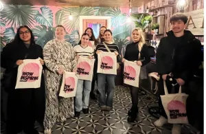 a group of people posing for a photo