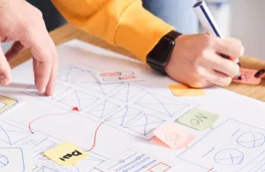 a close up of a person cutting a piece of paper