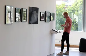 a person standing in front of a window