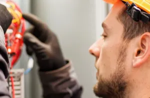 a close up of a man wearing a hat