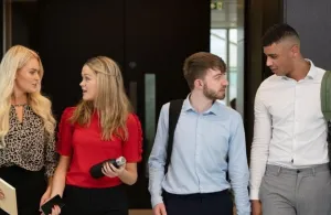 Students walking in a corridor