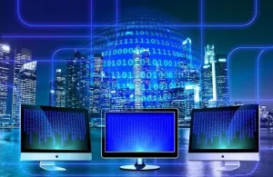 Three computers depicting digital transformation