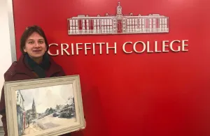 Tetiana Milshyna and her painting at Griffith College Cork