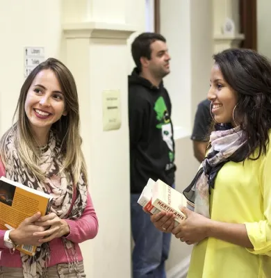 a group of people standing in a room