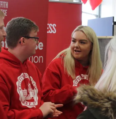 a group of people looking at each other