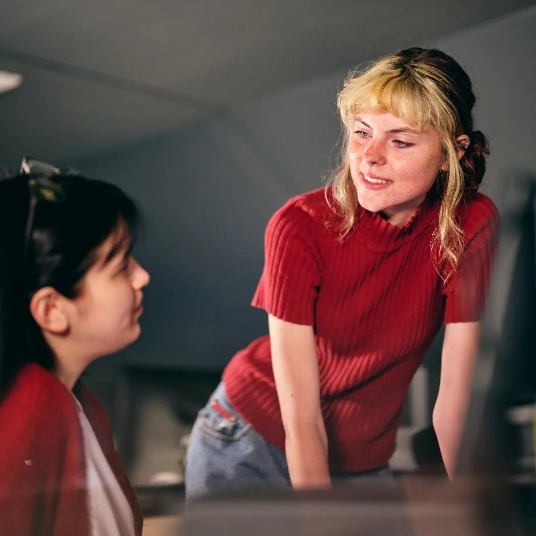 Student assisting another student