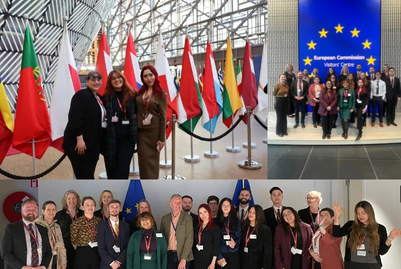 EU TRIP 2026 a group of people standing in front of a crowd posing for the camera