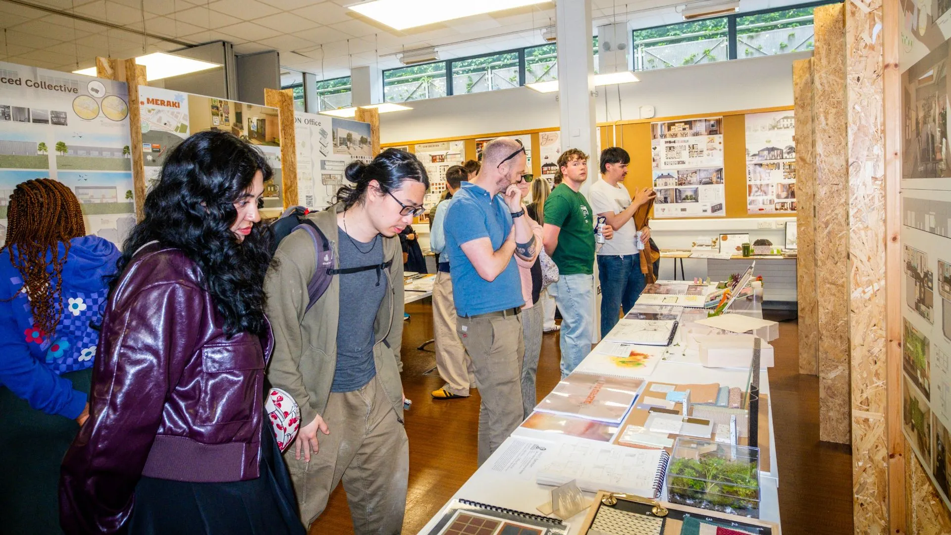 a group of people standing in a room