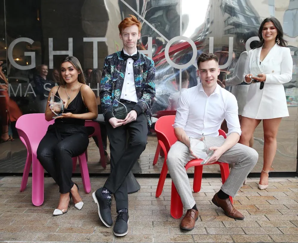 Griffith College film students posing with their awards outside the Lighthouse Cinema, Dublin