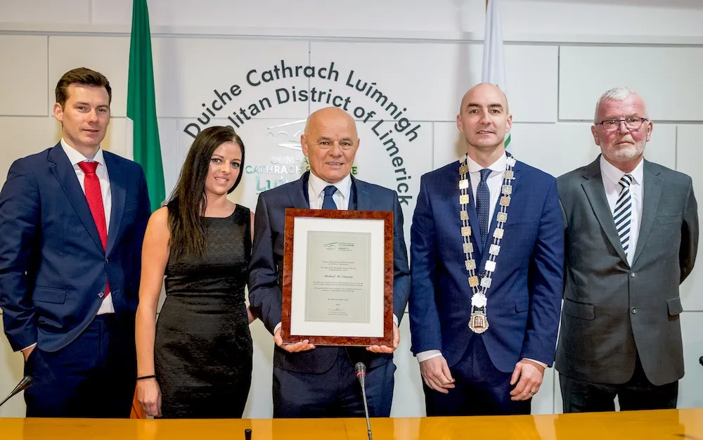 Michael McNamara receives a scroll from the Mayor of Limerick, Daniel Butler (Photo credit: Keith Wiseman)