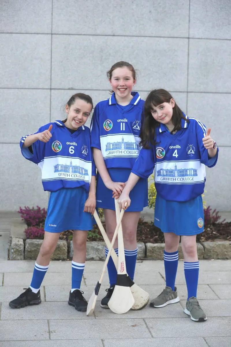 Players from Kevin's Camogie pose on the Griffith College Dublin campus