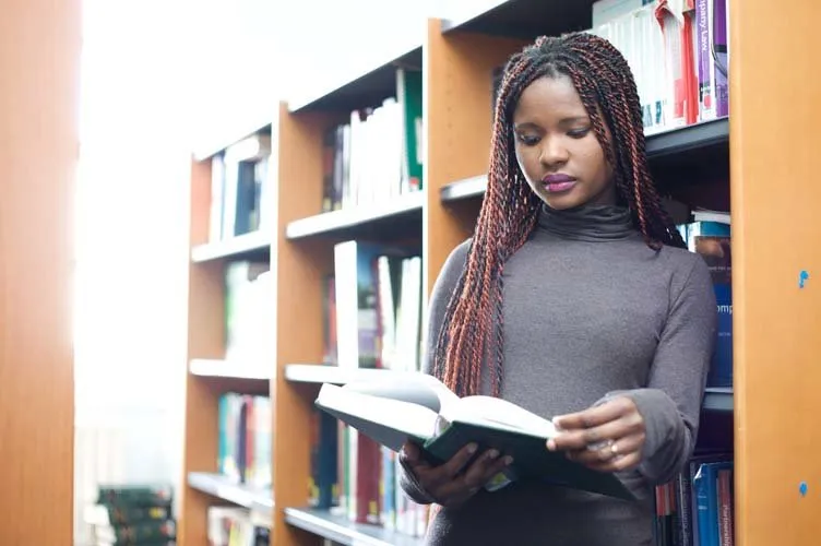 Girl preparing in library