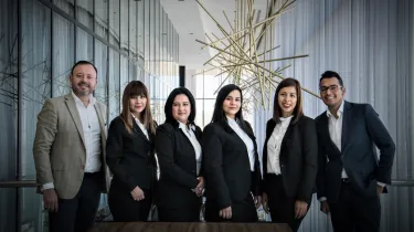 a group of people posing for the camera