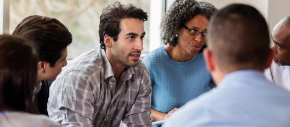 a group of people looking at the camera