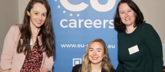 three women posing for the camera