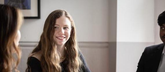 a woman looking at the camera